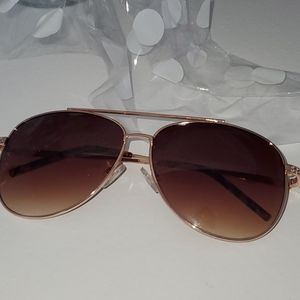 Gold framed sunglasses